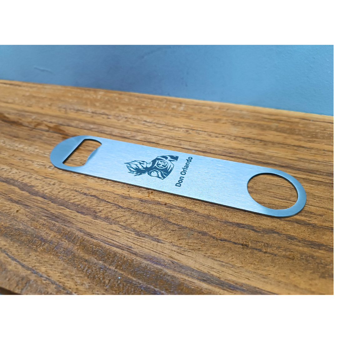 Destapador plano metalico